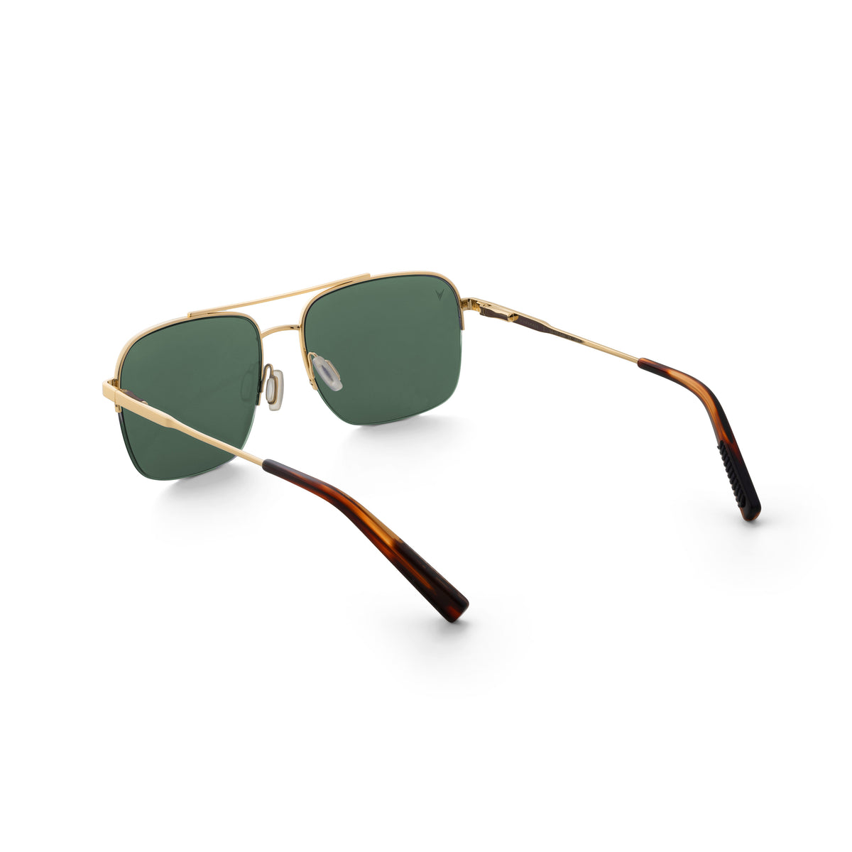 Sunglasses with gold frame and tortoiseshell arms on a white background