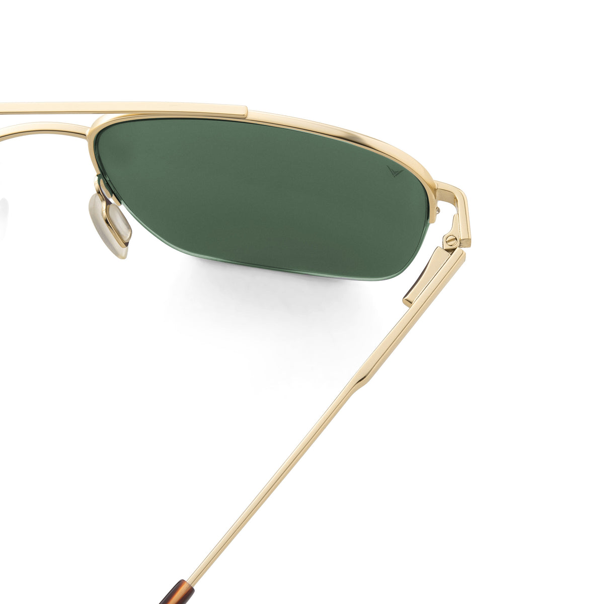 Gold-framed sunglasses with green lenses on a white background