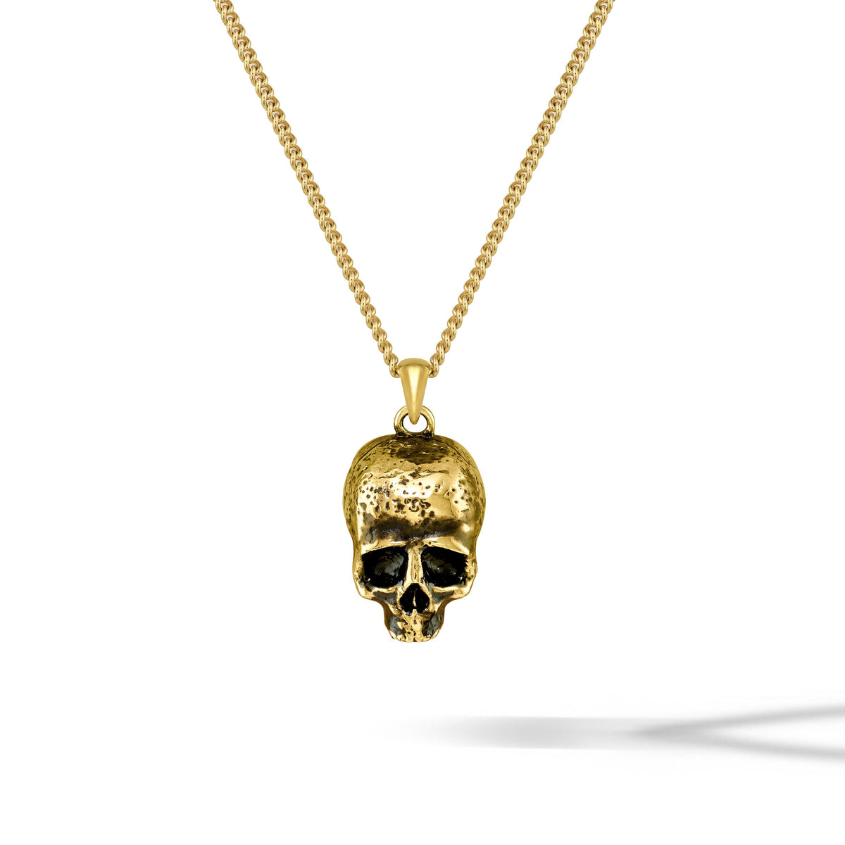 Gold momento mori skull pendant for men