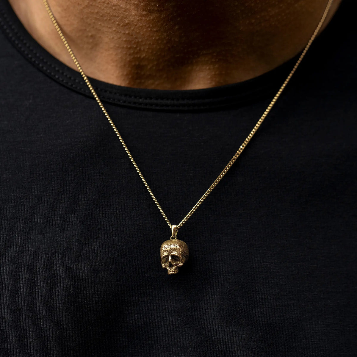 Gold momento mori skull pendant for men
