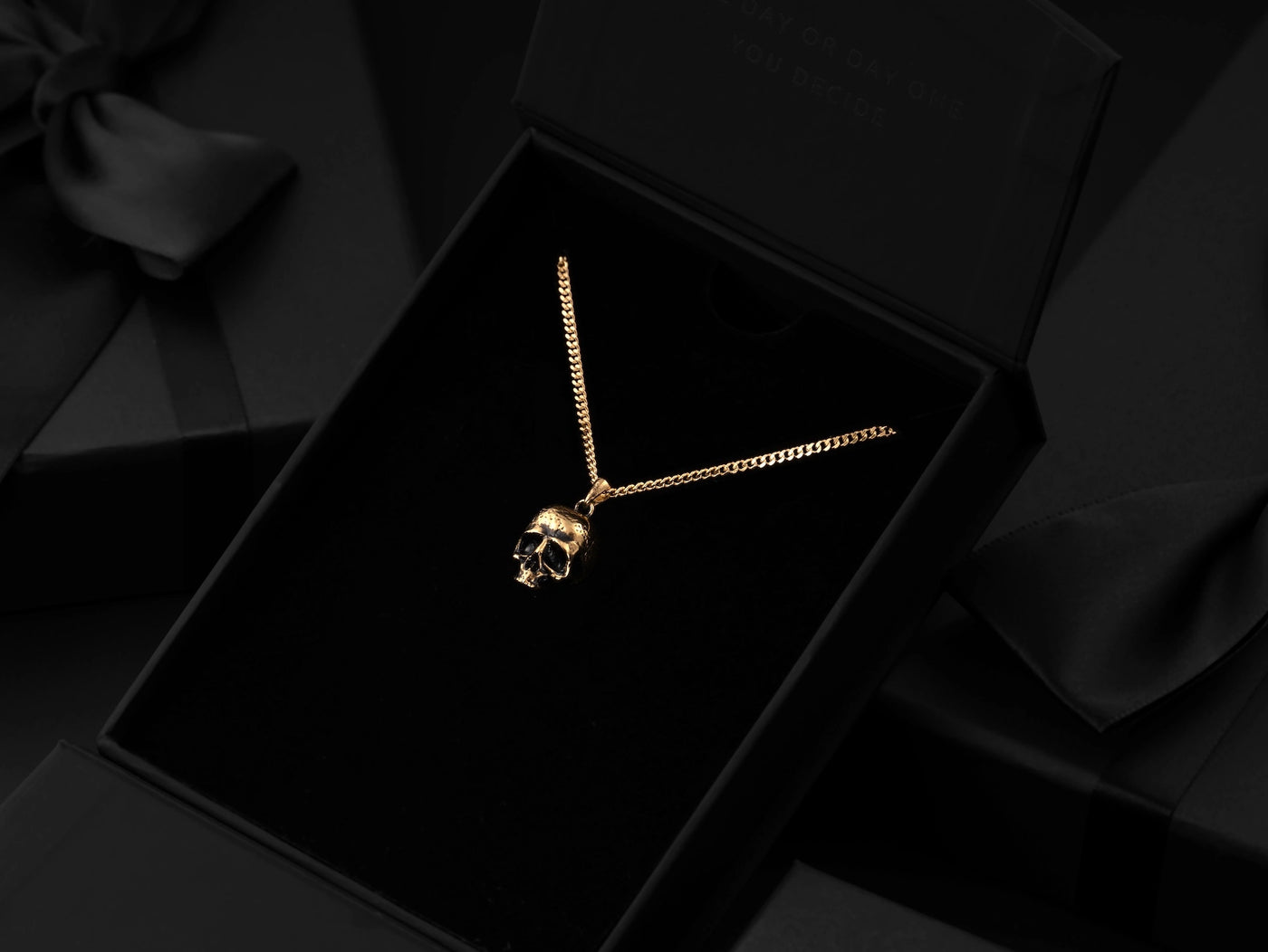 Gold momento mori skull pendant for men