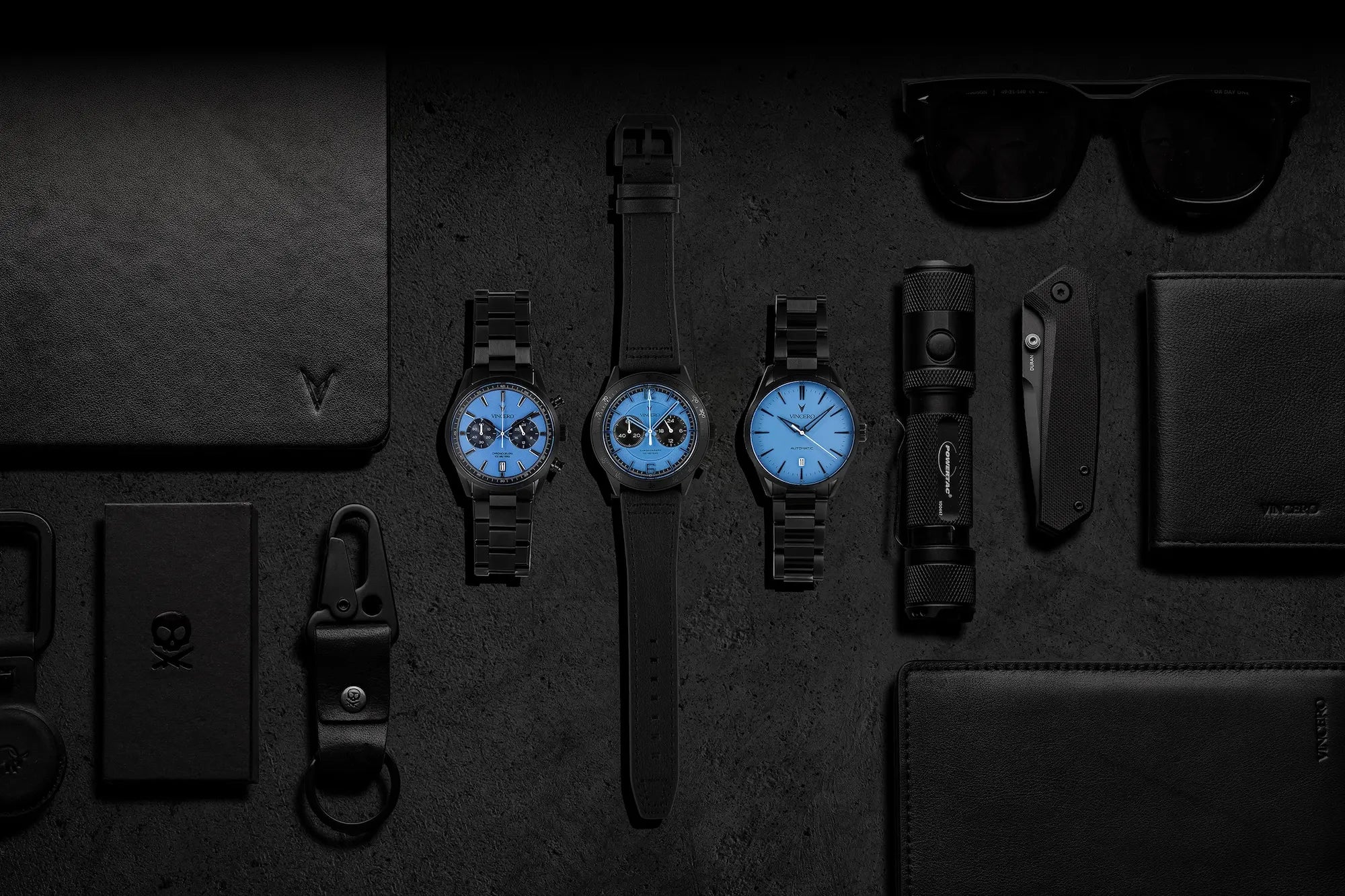 Chrono Limited Release, Apex Limited Edition, Icon Automatic watches displayed on a desk with EDC items. 