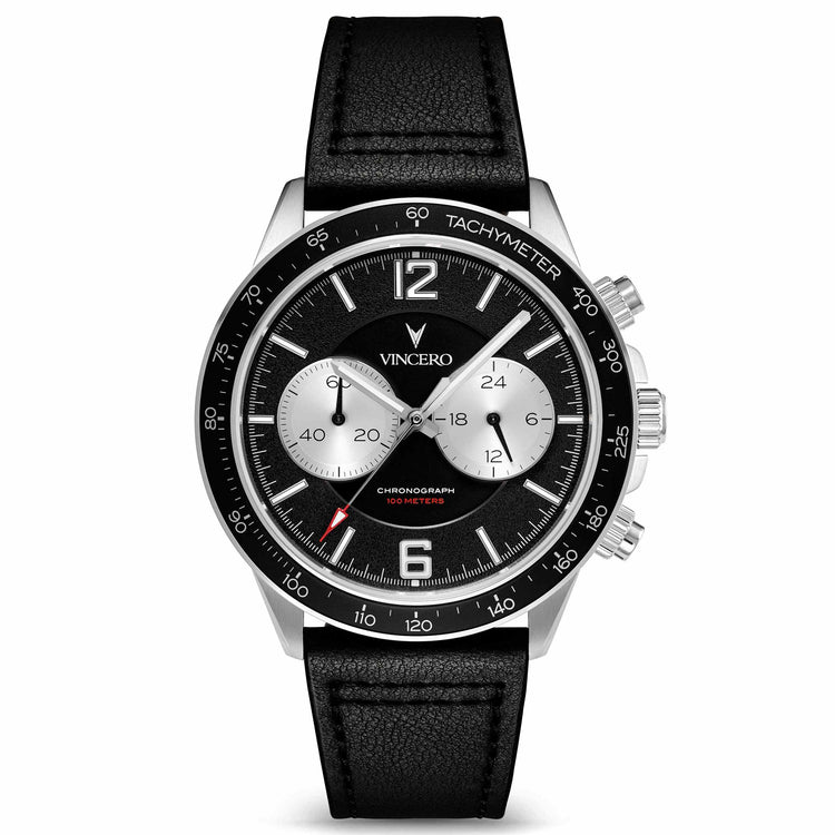 A silver and black Vincero watch with a leather strap, a chronograph dial, and a tachymeter on the bezel.