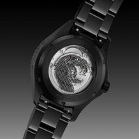 Black watch with visible brand logo on a dark background