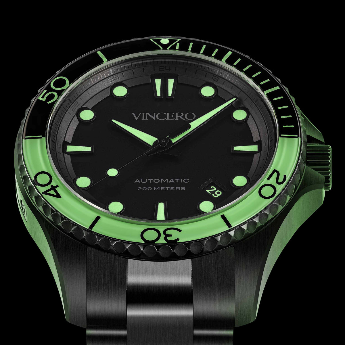 Vincero watch with black face and green accents on a black background
