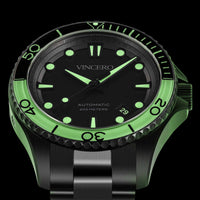 Vincero watch with black face and green accents on a black background