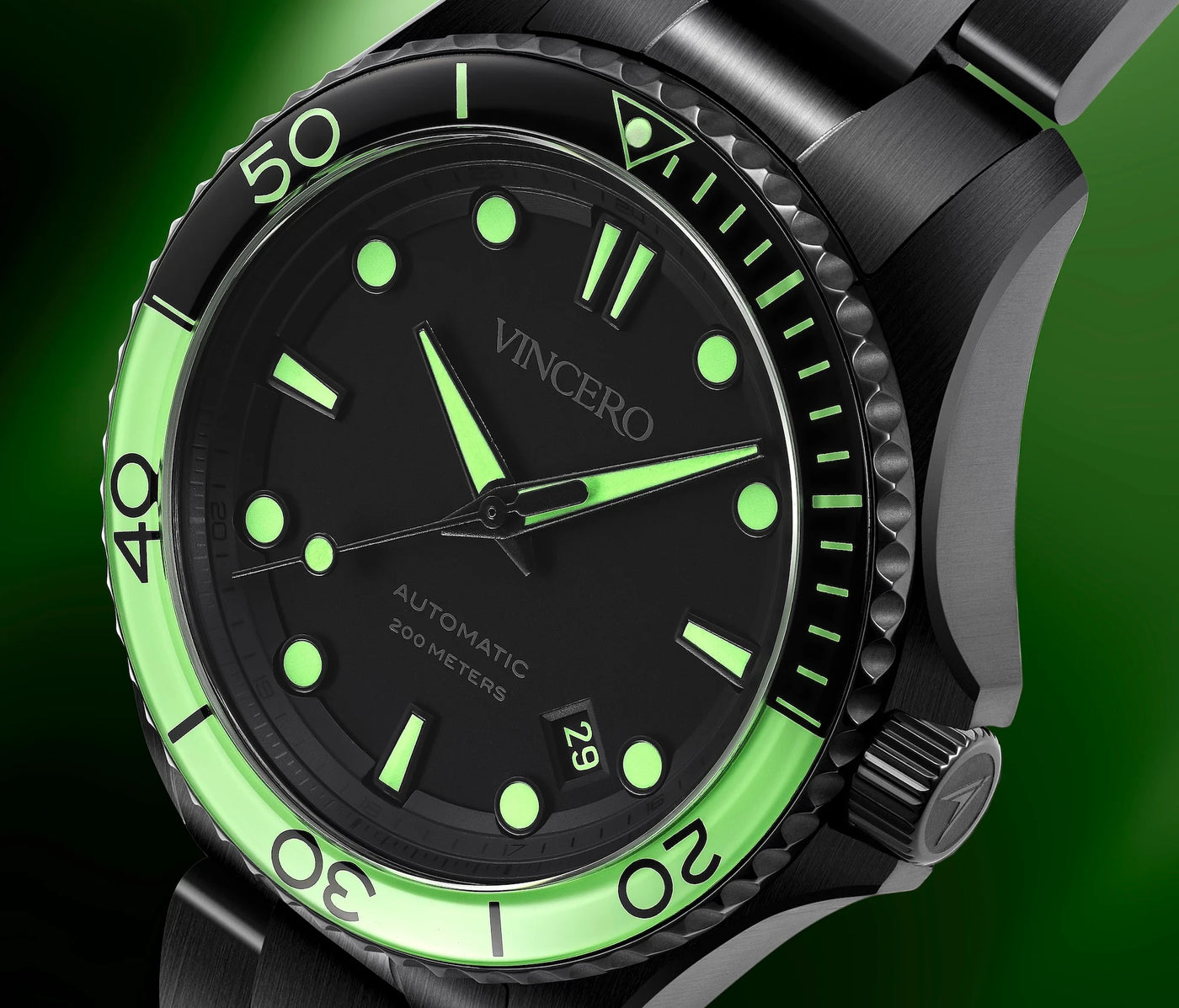 Black and green watch with 'Vincero' branding on a dark background