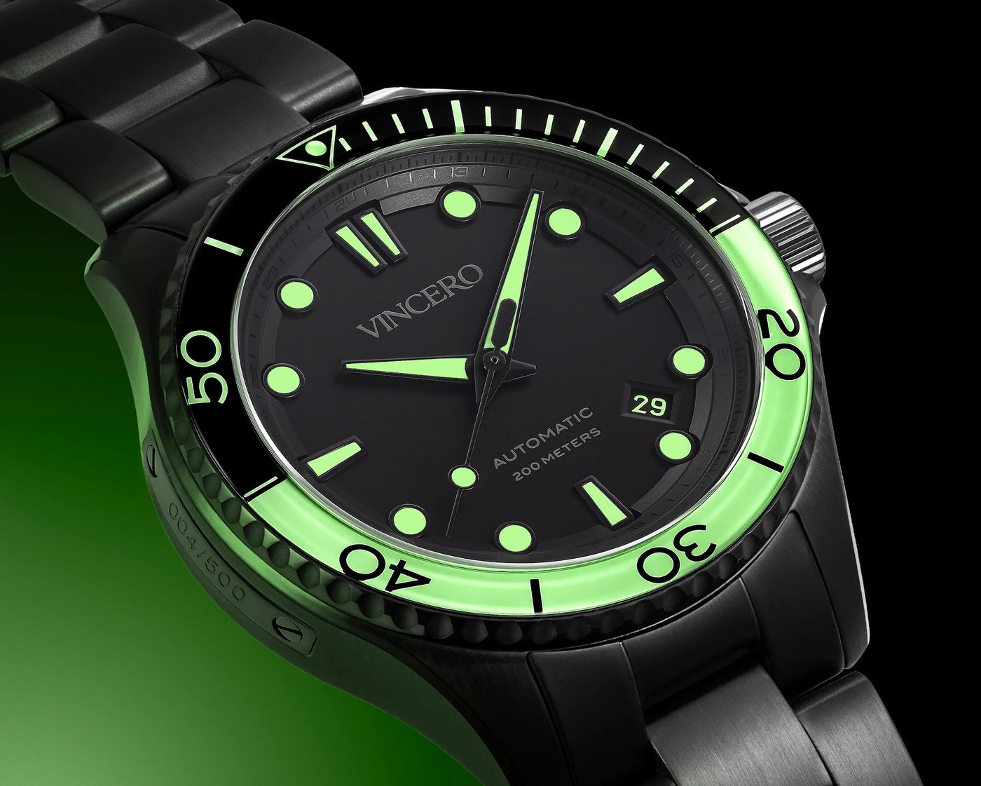 Vincero watch with black face and green accents on a dark background