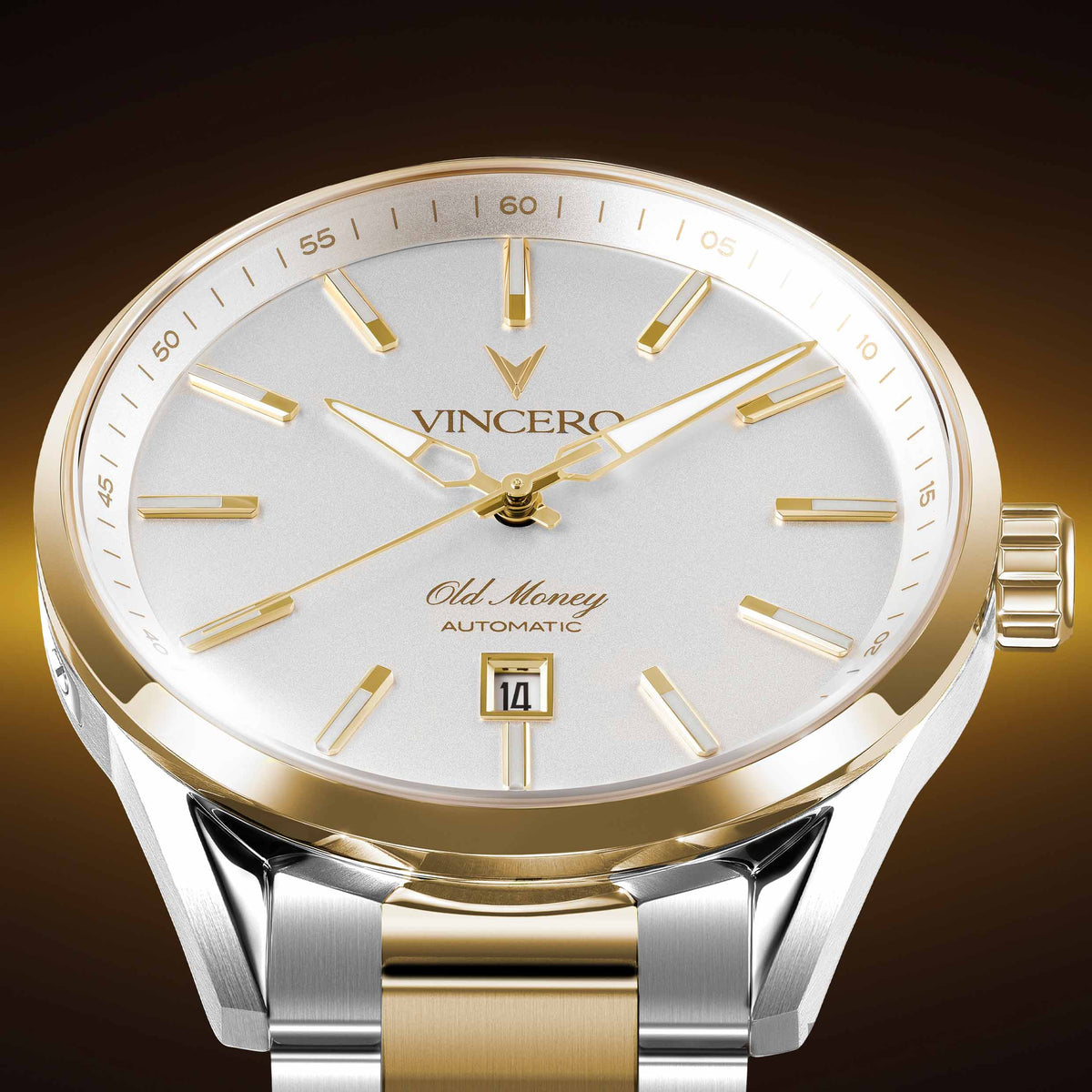 A luxury two-tone wristwatch by Vincero, featuring a white dial with gold-tone markers and hands, a gold bezel, and a silver and gold link bracelet, set against a dark brown gradient background.