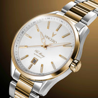 A close-up studio shot of a VINCERO men's automatic watch with a two-tone silver and gold stainless steel bracelet, a gold-tone bezel, and a white dial with gold indices.