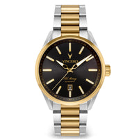 A two-tone automatic watch by Vincero with a black dial, gold-tone markers and hands, and a silver and gold link bracelet, shown on a white background.