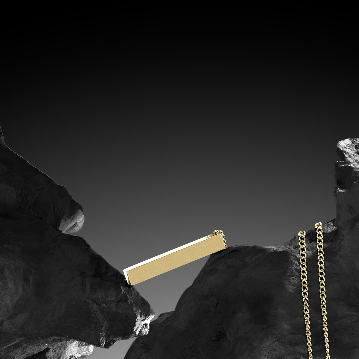 Gold bar and chain on a black background