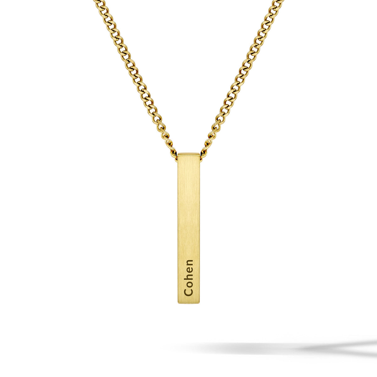 Gold necklace with a vertical bar pendant engraved with 'Cohen' on a white background