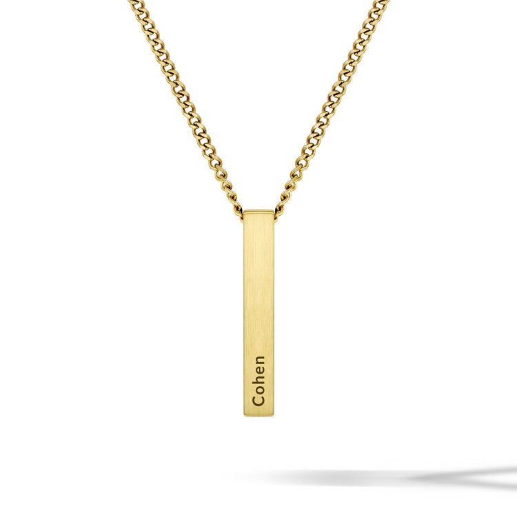 Gold necklace with a vertical bar pendant engraved with 'Cohen' on a white background
