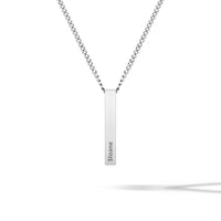 Silver necklace with a bar pendant on a white background