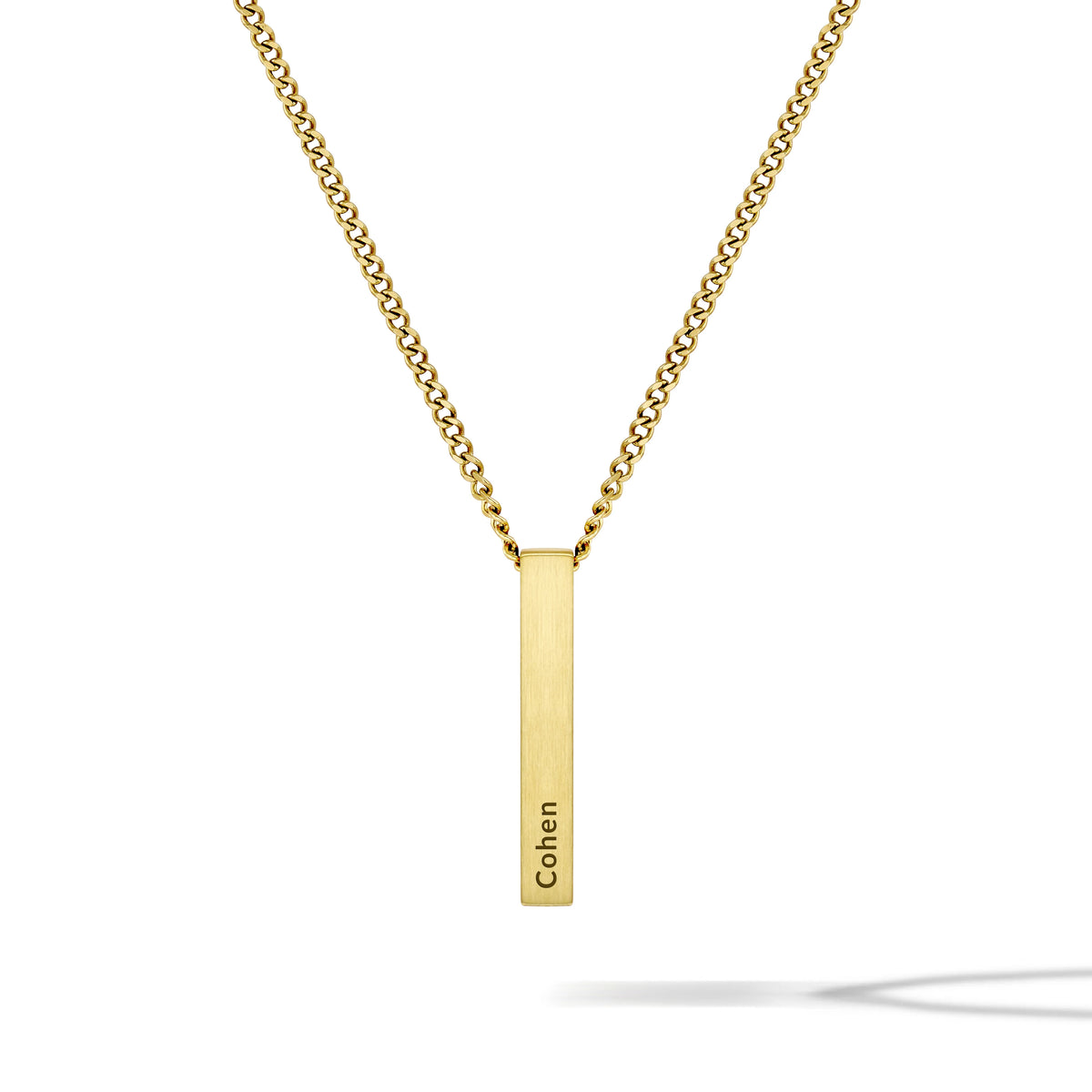 Gold necklace with a vertical bar pendant on a white background