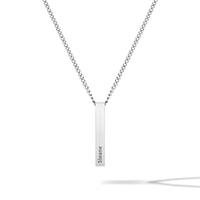Silver necklace with a bar pendant on a white background