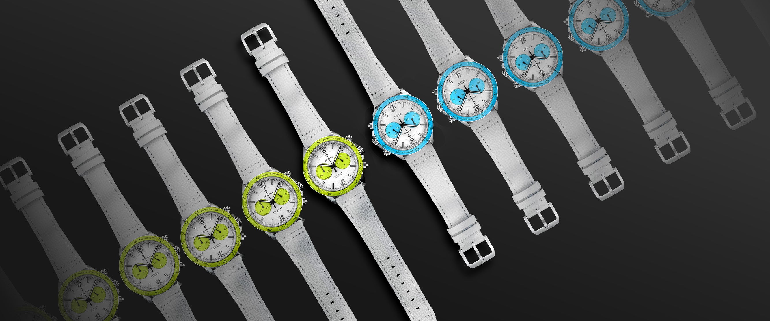 Row of watches with different colored face designs on a dark background