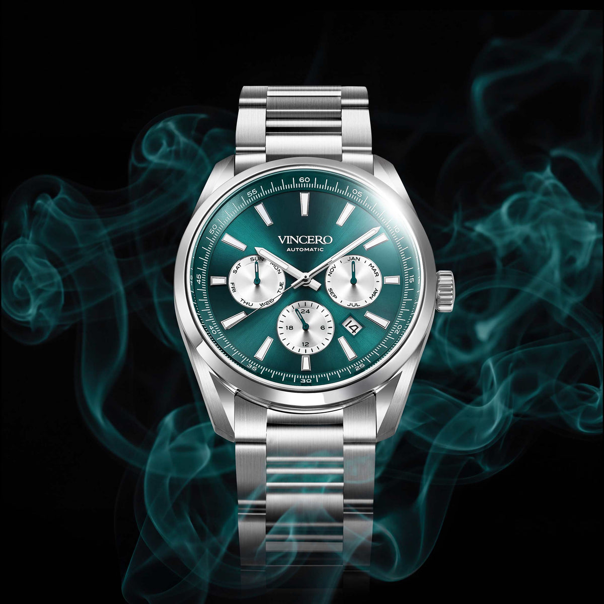 A silver stainless steel wristwatch with a green dial and three subdials, shown against a black background with glowing teal smoke effects. The brand name 'VINCERO' is visible on the watch face.