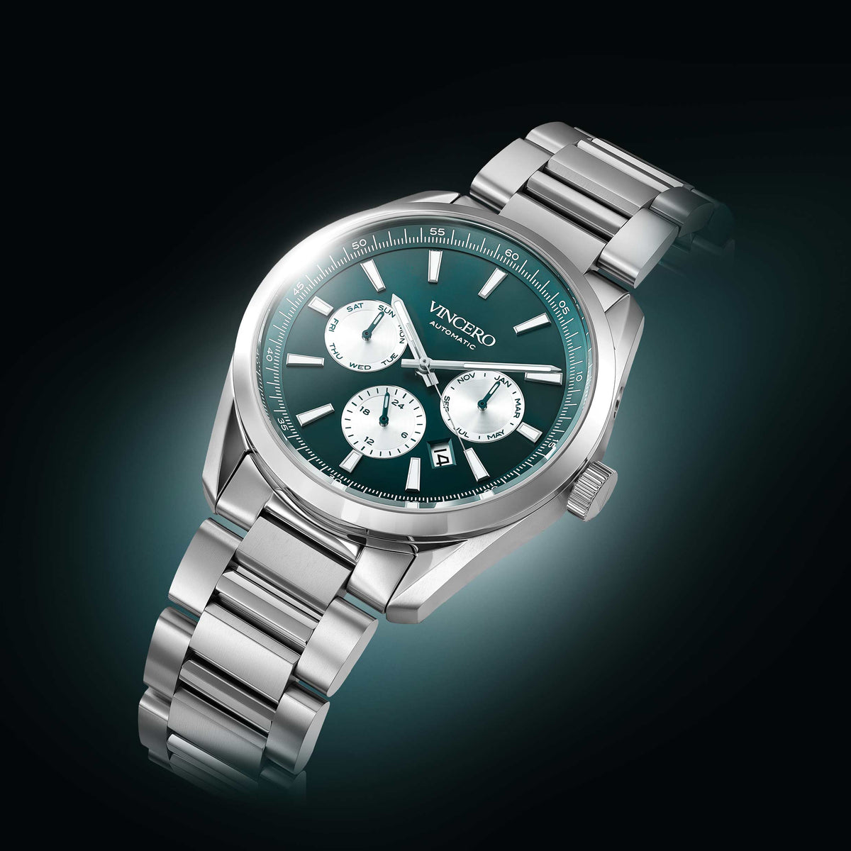A silver stainless steel wristwatch with a dark green dial and three white subdials, branded VINCERO, shown on a dark gradient background.