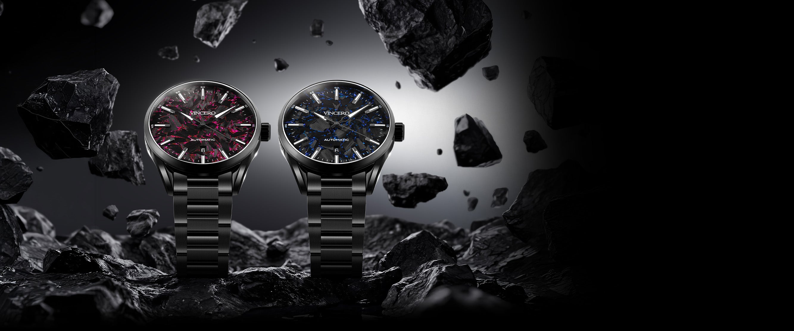 Two watches on a dark background with rocky elements