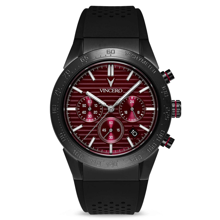 A black silicone strap watch with a gunmetal case and a red dial, featuring a chronograph function and a sapphire crystal glass.