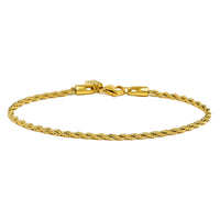 Gold rope chain bracelet on a white background