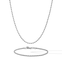 Silver chain necklace and bracelet on a white background