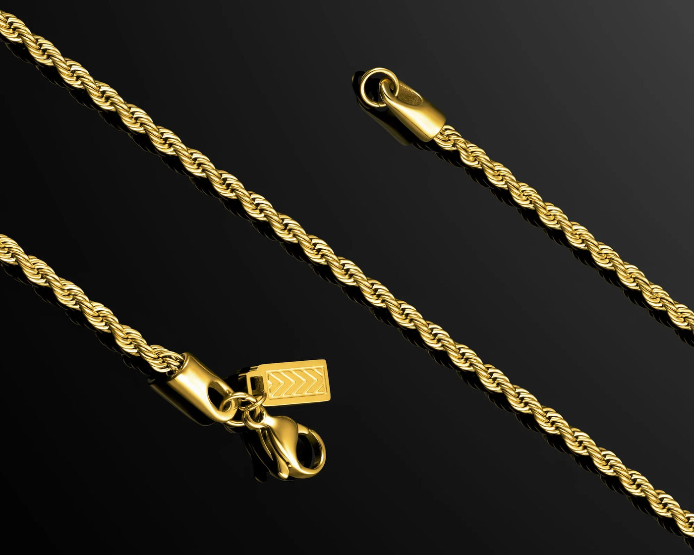 Gold rope chain necklace with clasp on a black background