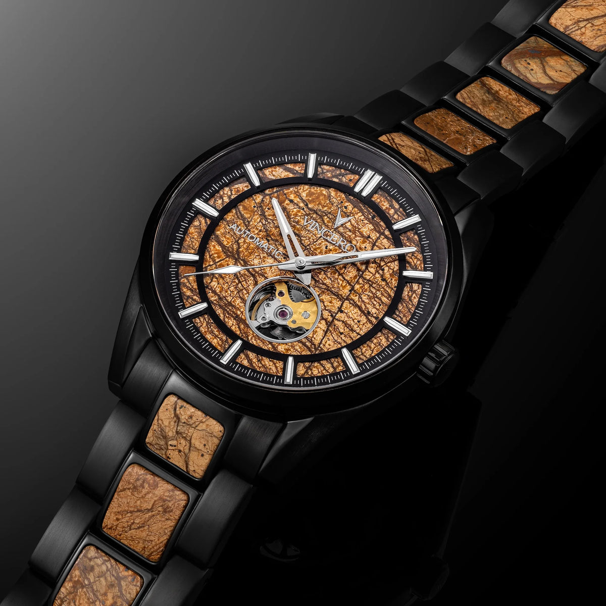 Luxury watch with intricate design on a dark background