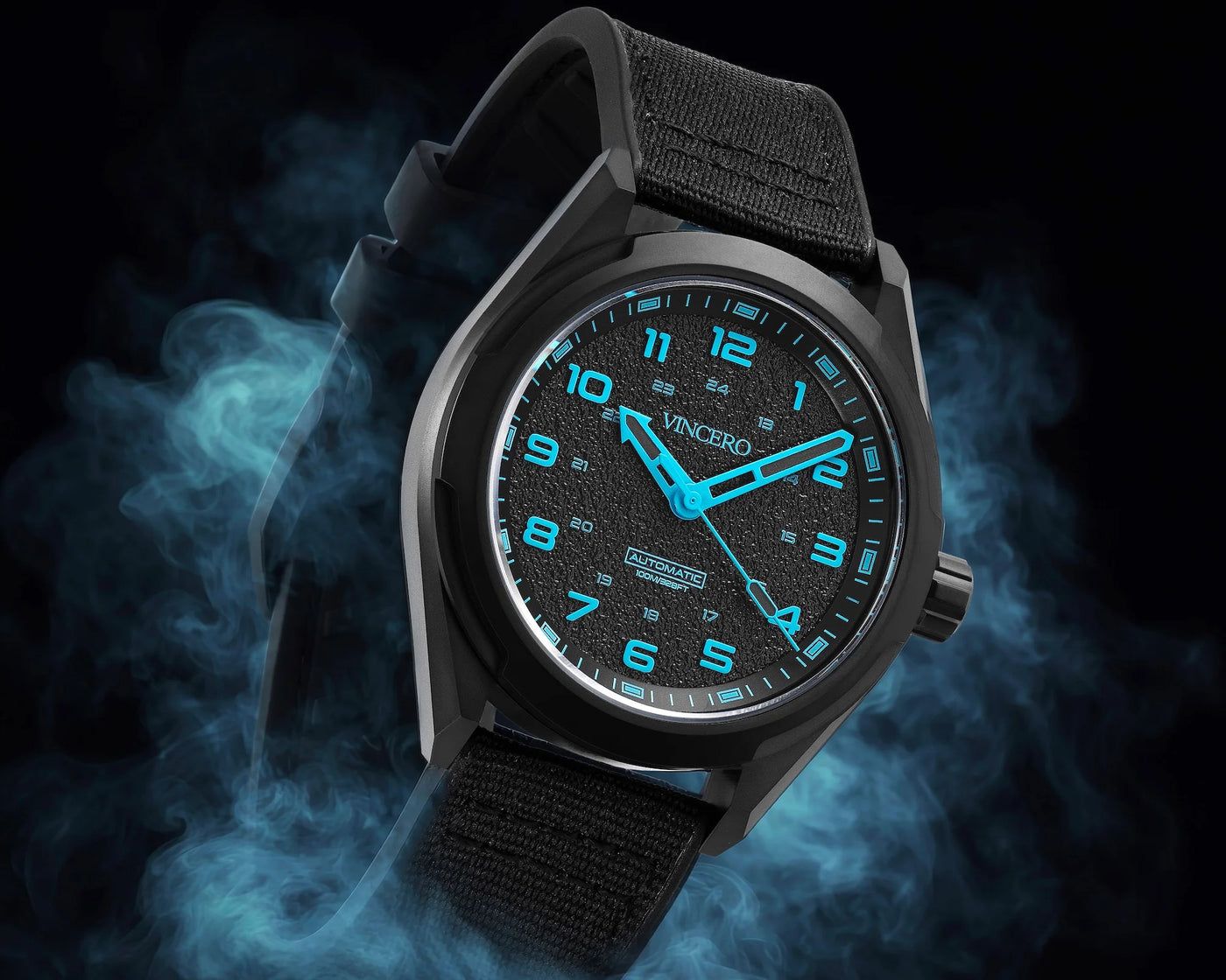 Black wristwatch with blue glowing face on a dark background