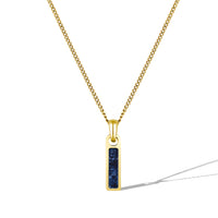 Gold necklace with a blue pendant on a white background