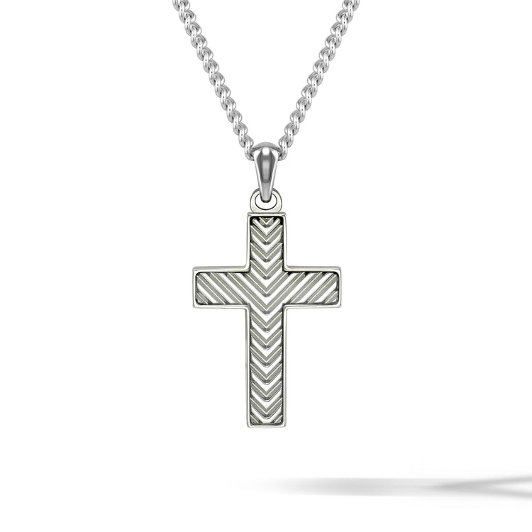 A sterling silver cross pendant necklace with a textured chevron pattern, suspended from a matching silver ball chain against a white background.
