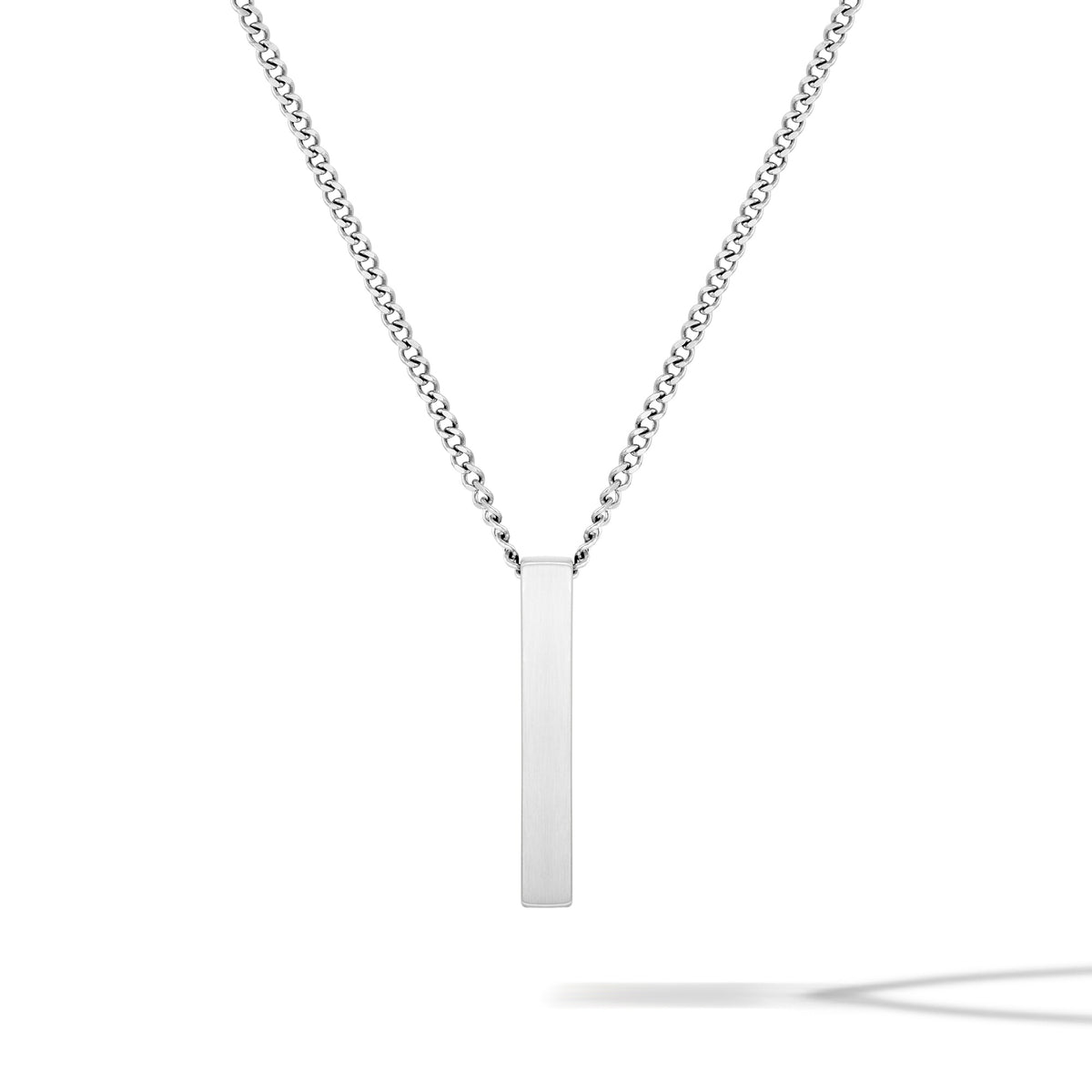 Silver necklace with a vertical bar pendant on a white background