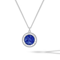 Silver necklace with a blue Saint Christopher pendant on a white background