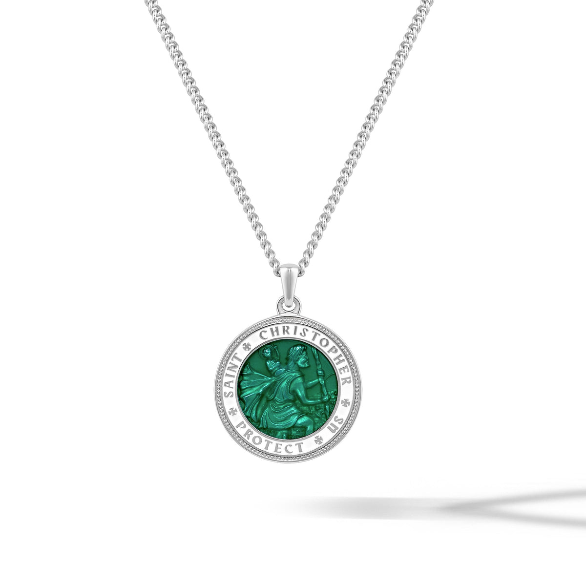 Silver necklace with a green pendant on a white background