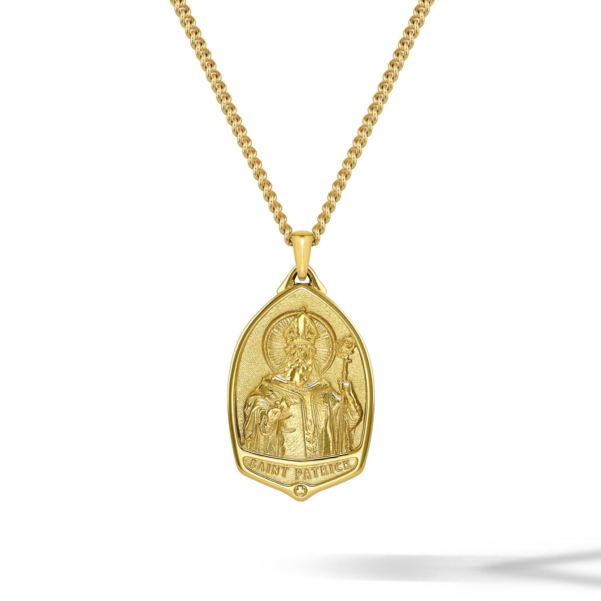 Gold necklace with a pendant on a white background