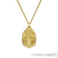Gold necklace with a pendant on a white background