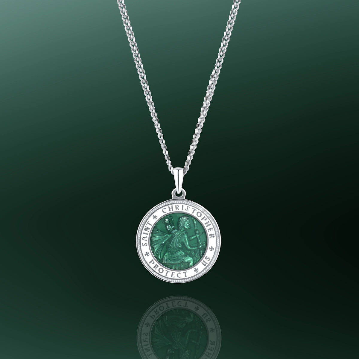 Silver necklace with a green pendant on a dark green background