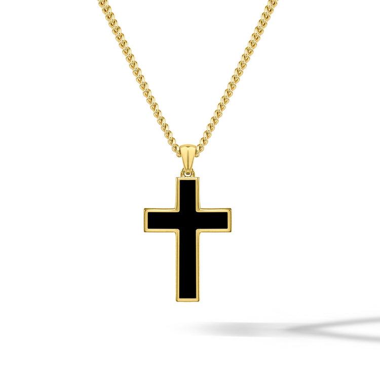 Gold necklace with a black cross pendant on a white background