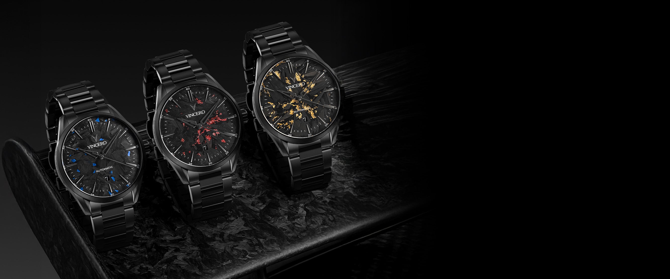 Three black wristwatches with unique face designs on a dark background