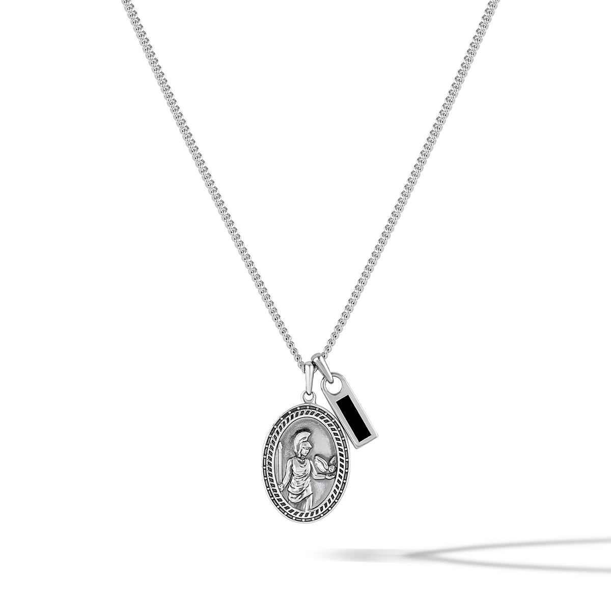 Silver necklace with a pendant on a white background