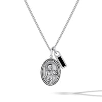 Silver necklace with two pendants on a white background