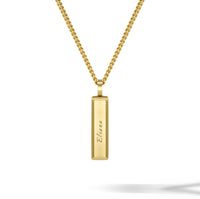 Gold necklace with a rectangular pendant on a white background