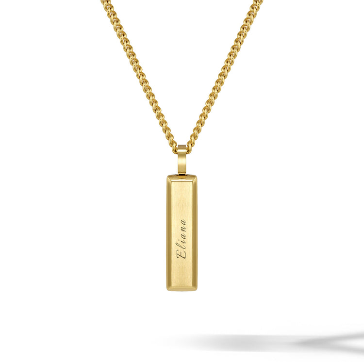 Gold necklace with a rectangular pendant on a white background
