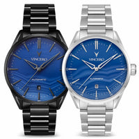 Two Vincero watches, one black and one silver, with blue faces on a white background.