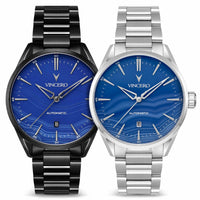 Two Vincero watches, one black and one silver, with blue faces on a white background.