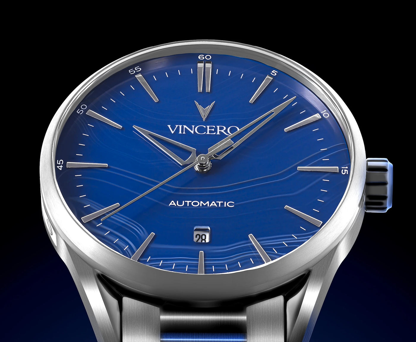Wristwatch with blue dial and silver case on a black background