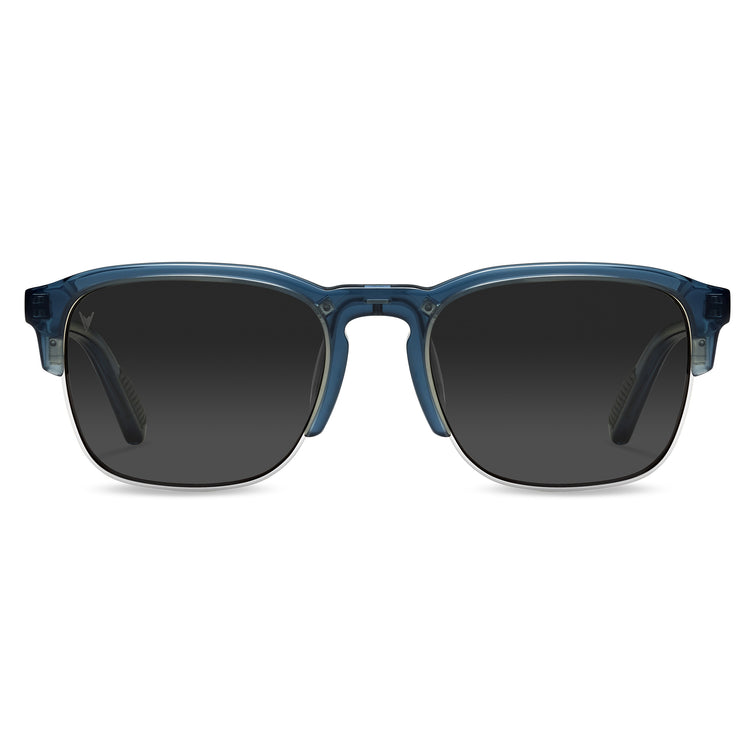 Blue sunglasses with dark lenses on a white background