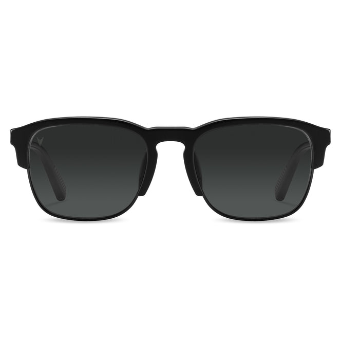 Black sunglasses with dark lenses on a white background